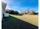 Spacious backyard with grassy area and mature trees at 15025 Sw 24Th Cir, Ocala, FL 34473