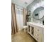 Updated bathroom with a vanity, shower, and neutral color palette at 15025 Sw 24Th Cir, Ocala, FL 34473
