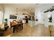 Open concept dining area with kitchen views and wood table at 15025 Sw 24Th Cir, Ocala, FL 34473