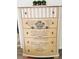 Antique-style dresser with decorative detailing and ornate knobs at 15025 Sw 24Th Cir, Ocala, FL 34473
