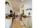 Modern kitchen with stainless steel appliances and wood countertops at 15025 Sw 24Th Cir, Ocala, FL 34473