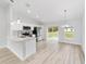 Modern kitchen with stainless steel appliances and white cabinetry at 17039 Sw 22 Terrace Rd, Ocala, FL 34473