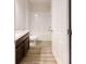 Clean bathroom with tub shower combination and granite vanity at 178 Pine Crse, Ocala, FL 34472