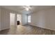 Bright bedroom with an ensuite bathroom and ceiling fan at 178 Pine Crse, Ocala, FL 34472