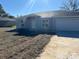 Newly constructed home with a two-car garage and well-maintained lawn at 178 Pine Crse, Ocala, FL 34472