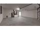 Attached garage with laundry hookups and extra storage space at 178 Pine Crse, Ocala, FL 34472