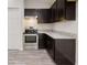 Modern kitchen featuring stainless steel appliances and granite countertops at 178 Pine Crse, Ocala, FL 34472