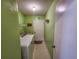 Bright laundry room, featuring washer, dryer, and storage at 17871 Se 107 Ct, Summerfield, FL 34491