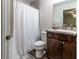 Clean bathroom with shower/tub combo and wood vanity at 31 Juniper Loop Ter, Ocala, FL 34480