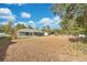 Large backyard with some trees at 3648 Sw 131St Place Rd, Ocala, FL 34473
