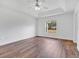 Bright bedroom with wood-look flooring and large window at 3648 Sw 131St Place Rd, Ocala, FL 34473