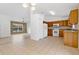 Open kitchen with view into living room and access to backyard at 3648 Sw 131St Place Rd, Ocala, FL 34473