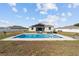 Inviting rectangular pool with patio furniture in backyard at 4812 Se 37Th St, Ocala, FL 34480