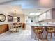 Kitchen and dining area with light wood table and chairs at 5032 Se 108Th St, Belleview, FL 34420