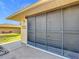 House exterior featuring a screened garage at 5032 Se 108Th St, Belleview, FL 34420