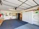 Garage with additional storage and a laundry area at 5032 Se 108Th St, Belleview, FL 34420