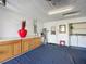 Garage with extra storage, workbench, and laundry hookups at 5032 Se 108Th St, Belleview, FL 34420