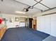 Spacious garage with washer, dryer, and extra storage at 5032 Se 108Th St, Belleview, FL 34420