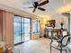 Relaxing living room, access to screened patio, hardwood floors at 5032 Se 108Th St, Belleview, FL 34420
