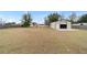 Large backyard with detached garage and fenced perimeter at 6292 Se 87Th St, Ocala, FL 34472