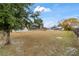 Large backyard with detached garage and fenced perimeter at 6292 Se 87Th St, Ocala, FL 34472