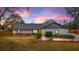 Charming ranch home with updated exterior, landscaping, and a walkway at 6292 Se 87Th St, Ocala, FL 34472