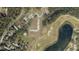 Aerial view of property near golf course and lake at 8178 Fairways Cir # U201, Ocala, FL 34472