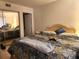 Spacious bedroom with mirrored closet doors at 8178 Fairways Cir # U201, Ocala, FL 34472