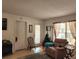 Bright living room with a door to the outside at 8178 Fairways Cir # U201, Ocala, FL 34472