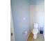 Small bathroom with toilet and tile floor at 8457 Sw 138Th Pl, Ocala, FL 34473
