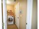 Bright laundry room with washer and dryer at 8457 Sw 138Th Pl, Ocala, FL 34473