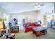 Living room with comfy seating and open floor plan at 8457 Sw 138Th Pl, Ocala, FL 34473