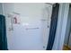 Clean shower with glass enclosure, grab bars and a shower curtain at 8457 Sw 138Th Pl, Ocala, FL 34473