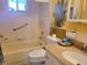 Clean bathroom with a shower/tub combo, toilet, and granite vanity at 8473 Sw 106Th St, Ocala, FL 34481