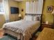 Main bedroom with a queen bed and ample closet space at 8473 Sw 106Th St, Ocala, FL 34481