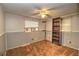 Spacious bedroom with brown carpet and built-in shelving at 10655 Ne 224Th Place Rd, Fort Mc Coy, FL 32134
