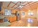 Bright kitchen with stainless steel appliances and wood cabinets at 10655 Ne 224Th Place Rd, Fort Mc Coy, FL 32134