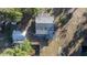 Overhead view of a house, detached garage, and yard at 11360 Se 188Th Ave, Ocklawaha, FL 32179