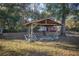Wooden shelter in a large backyard at 11360 Se 188Th Ave, Ocklawaha, FL 32179
