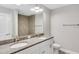 Modern bathroom with granite double vanity and updated fixtures at 13460 Sw 107 St, Dunnellon, FL 34432