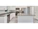 Modern kitchen with stainless steel appliances and granite countertops at 13460 Sw 107 St, Dunnellon, FL 34432