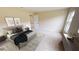 Spacious bedroom with a king-size bed and access to another room at 1697 Ne 161St St, Citra, FL 32113