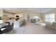 Modern kitchen features an island and breakfast bar at 1697 Ne 161St St, Citra, FL 32113