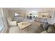 Open living space with kitchen, island, and dining area at 1697 Ne 161St St, Citra, FL 32113