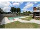 Refreshing pool with a concrete deck at 21441 Palatka Dr, Dunnellon, FL 34431