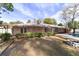 Home with a large backyard, featuring a pool and a fire pit at 2528 Se 15Th St, Ocala, FL 34471