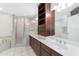 Bathroom with double vanity, shower, and separate tub at 2528 Se 15Th St, Ocala, FL 34471