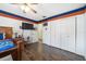 Bedroom with tile floors, ceiling fan and large closet at 2528 Se 15Th St, Ocala, FL 34471