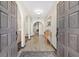 Elegant entryway with tiled floors and ornate doors at 2528 Se 15Th St, Ocala, FL 34471