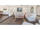 Spacious living room with hardwood floors and ample natural light at 2528 Se 15Th St, Ocala, FL 34471